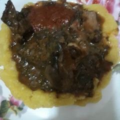 A picture of Local soup with garri.