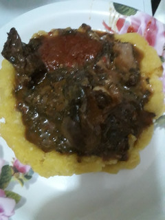 A picture of Local soup with garri.