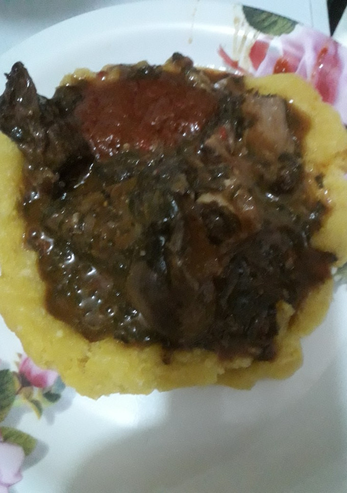 A picture of Local soup with garri.