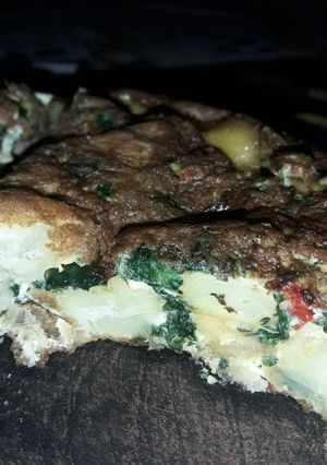 Una foto de Tortilla de papa y espinacas