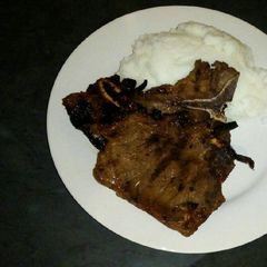 A picture of Grilled T bone steak.