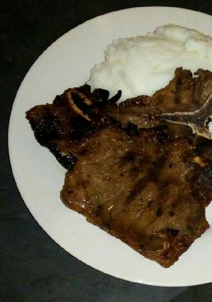 A picture of Grilled T bone steak.