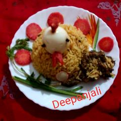 A picture of Kolkata Style Mutton Dum Biriyani.