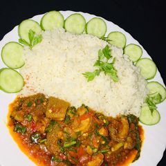 White rice with miyan alayyahu A picture of White rice with miyan alayyahu.