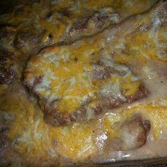 A picture of Cheesy baked pork chops.