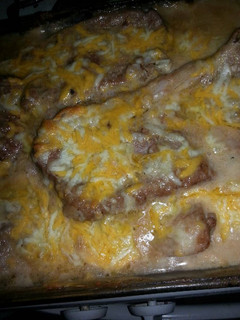 A picture of Cheesy baked pork chops.