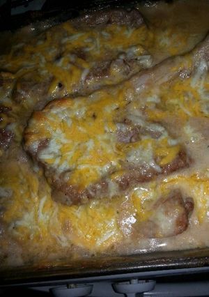 A picture of Cheesy baked pork chops.