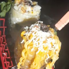 A picture of Lots of Cheesy Maggi with pasta & White pasta with mozzarella.