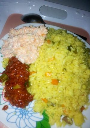 A picture of Fried rice and Salad.
