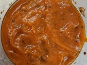 Una foto de salsa de tomate para pizza