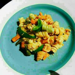 A picture of Pasta with seashells (clams).
