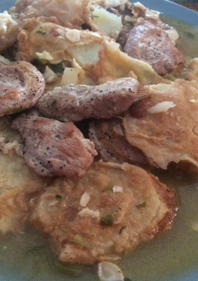 Una foto de Patatas a la importancia con solomillo de cerdo