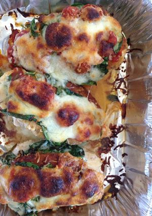 A picture of Stuffed spinach and cheese chicken breast.