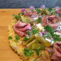 A picture of Rosti with summer herbs and beef roses.