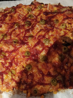 Una foto de Pizza casera en masa de cereales