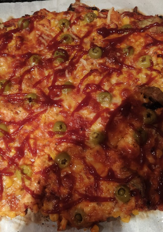 Una foto de Pizza casera en masa de cereales