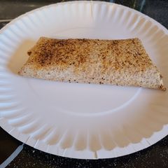 A picture of My daughters air fried cheesy crispy tortilla wrap.