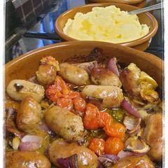A picture of Sausage and apple tray bake.