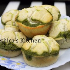 A picture of Layered Spinach Idli Muffins.