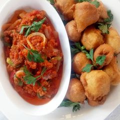 A picture of Akara with tomato stew.