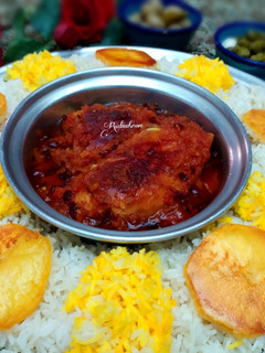 عکسی از دستور مرغ دم کرده با سس زرشک