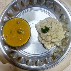 A picture of Ven Pongal And Sambar.