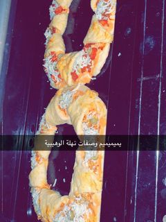 صورة لوصفة بيتزا لذيذة