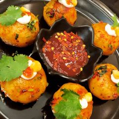 A picture of Spicy semolina stuffed pops.