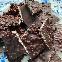 A picture of Reishi and chaga chocolate with crispy quinoa.