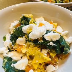 A picture of Feta Eggs with Spinach.