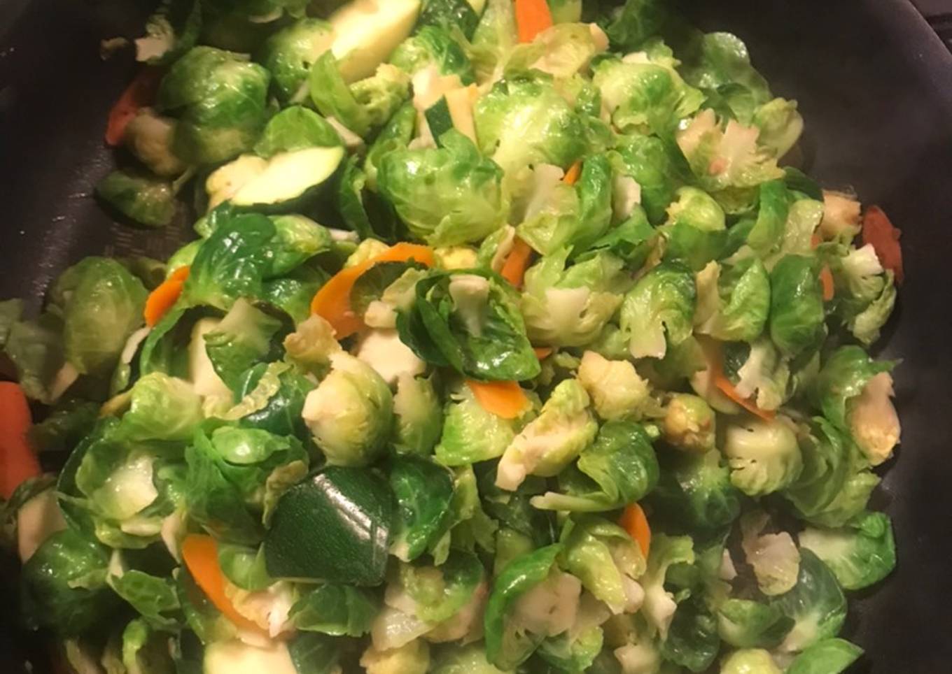 Fried brussel sprouts with carrots and zucchini