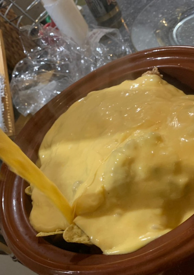 Una foto de Dip de queso cheddar