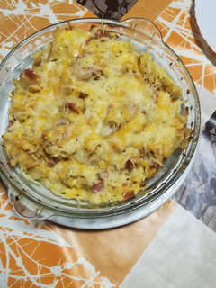 Una foto de Patatas con jamón gratinadas fácil y rápido