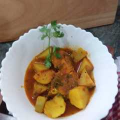 Una foto de মান দিয়ে মাছের কালিয়া (maan diye macher kalia recipe in Bengali)