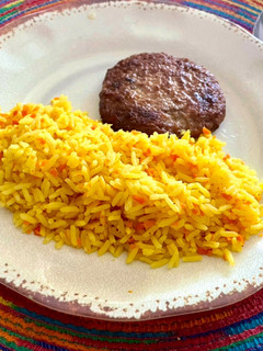 Una foto de Arroz graneado con zanahoria y naranja 🍊