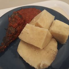 A picture of Boiled yam and pepper sauce.