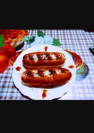 A picture of Tasty vegetable rajma masala hot dog.