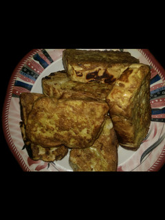 A picture of Bread into egg.
