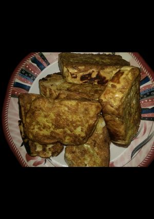 A picture of Bread into egg.