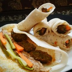 Dosa wrap with falafel A picture of Dosa wrap with falafel.