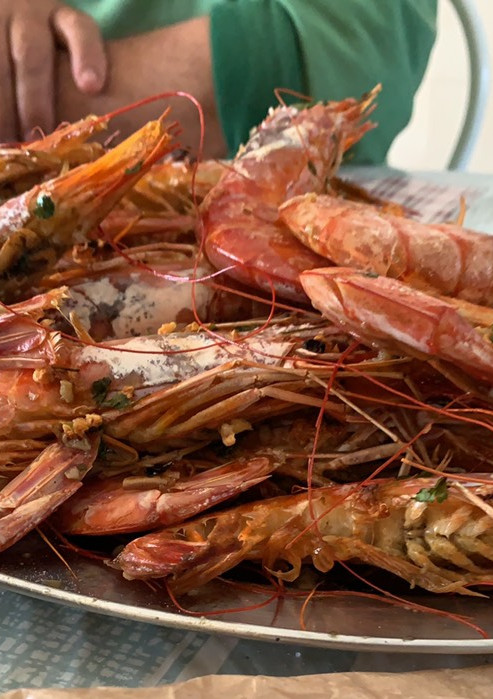 Una foto de Langostinos al horno 🦐