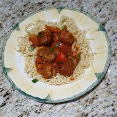 A picture of Meatballs with spaghetti.