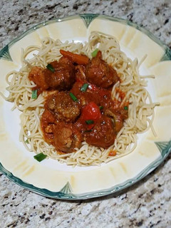 A picture of Meatballs with spaghetti.