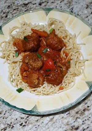 A picture of Meatballs with spaghetti.