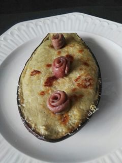 Una foto de Berenjena gratinada con anchoas