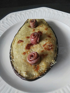 Una foto de Berenjena gratinada con anchoas