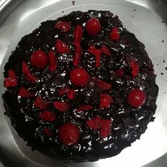 A picture of Chocolate cake with bourbon biscuits.