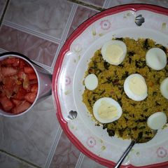 A picture of Dambu + eggs and fruit salad.