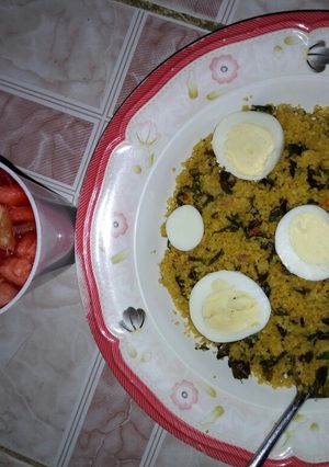 A picture of Dambu + eggs and fruit salad.