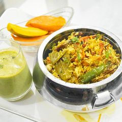 A picture of Kathal biryani with pudina dhania chhachh.